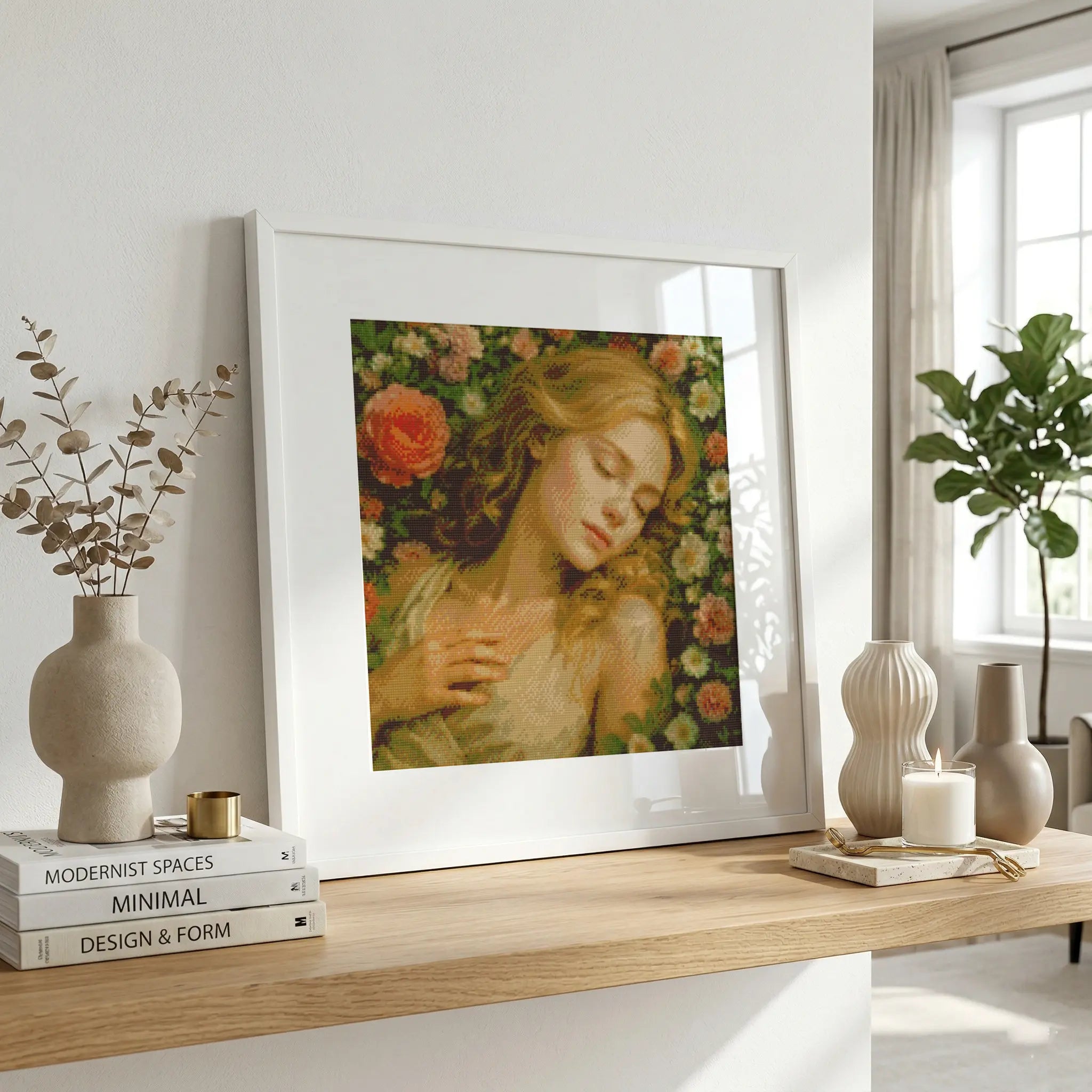 Framed artwork of a woman with flowers on a wooden shelf in a bright room. Sleeping Beauty in Rose Garden | Diamond Painting Kit